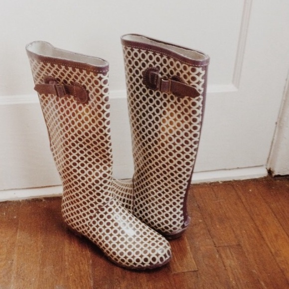 Purple and white rain boots