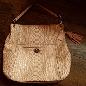 Snakeskin coach bag