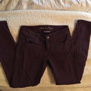 Super stretch burgundy AE jeans.