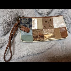 Authentic Coach wristlet.