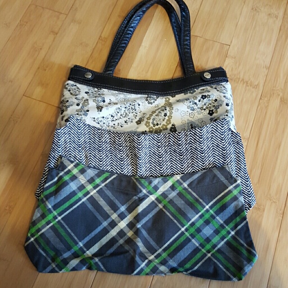 ** SOLD**Thirty-one black skirt purse and 3 skirts