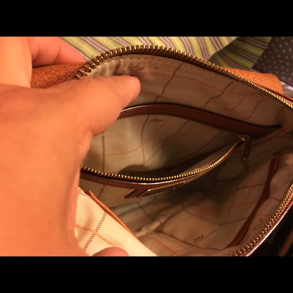 RL brown body bag has the authenticity card