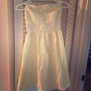 Pastel yellow Searsucker strapless dress.