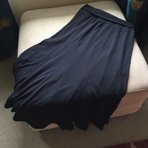 Long black skirt, fold over waist.
