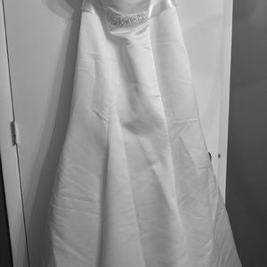 Wedding dress never worn or altered.