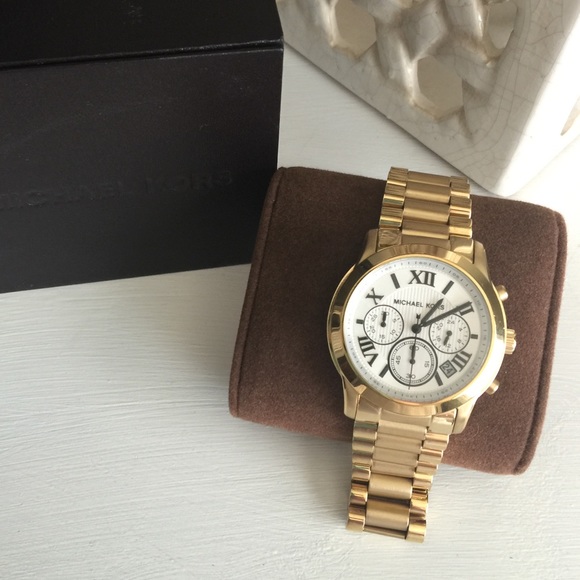 Women's gold Michael kors watch