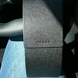 Black Prada sunglass case