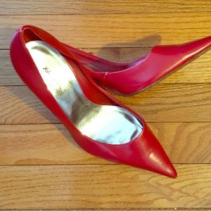 Red pumps with wooden heel