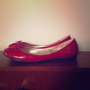 Size 10 red MIA flats. Gently worn.