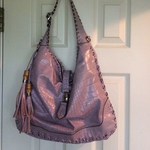 Lavender faux leather shoulder/cross body bag.