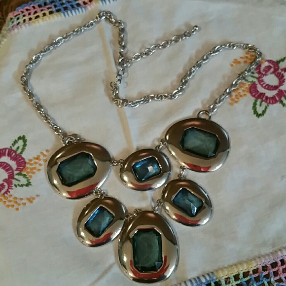 Turquoise colored stones in silver tone necklace
