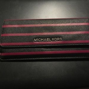 Michael Kors envelope style wallet they call it