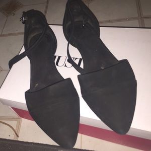Black pointed flats.