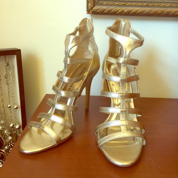 Gold strappy high heeled dress sandals