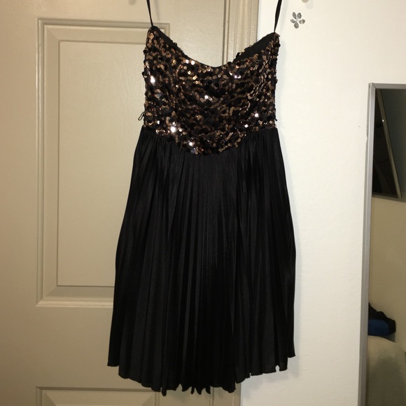 Sparkly black and beige dress.