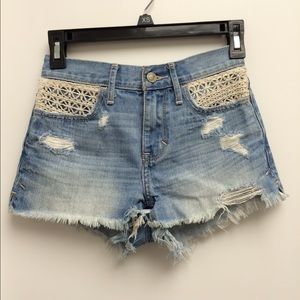 High rise light wash denim shorts