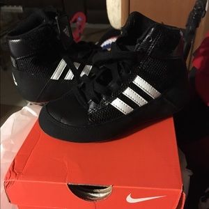 Youth/Toddler size 10 Adidas tennis shoe.