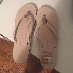 NEVER WORN RAINBOW FLIP FLOPS