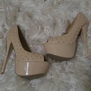 Tan spiked heels