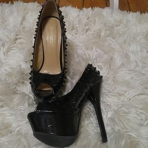 Black spiked heels
