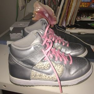 Silver Nikes.