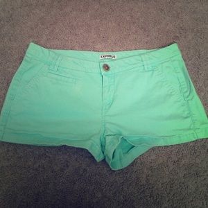 Size 6 Express shorts in a mint color.