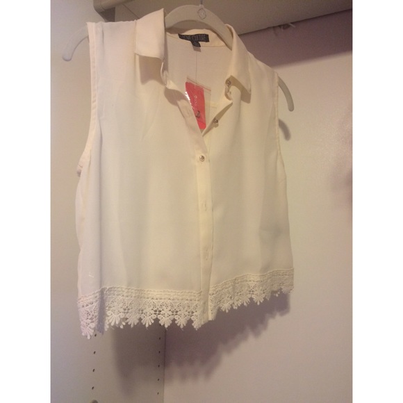 Cream sleeveless crop top