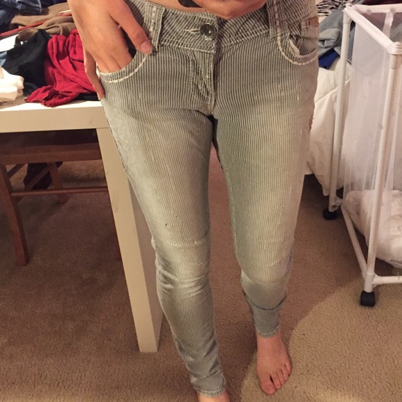 Grey with white striped jeans by Rewind.