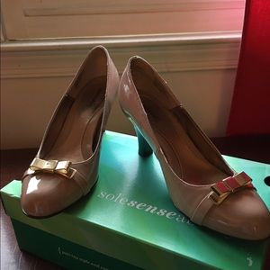 Patent leather bow pumps