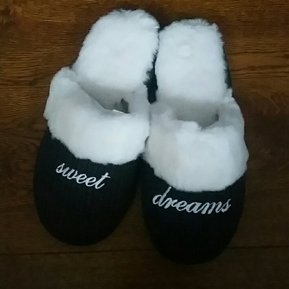 Victoria secret slippers size Medium.