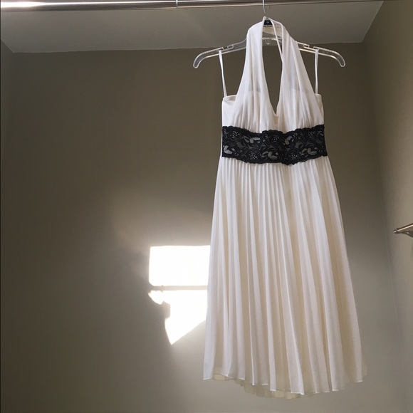 Cream halter dress with black lace belt trim