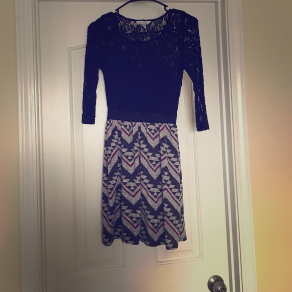 Black and chevron dress. Tight around waist.
