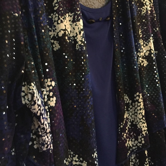 Shirt + stretchy material ruffled cover. Jeweled