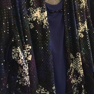 Shirt + stretchy material ruffled cover. Jeweled