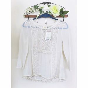 Beautiful NWT white beaded and lace detail top!