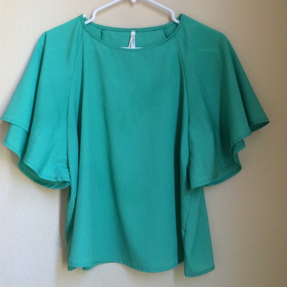 green flowy shirt