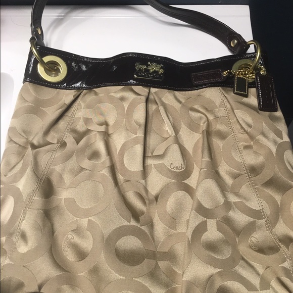 Like new fabric Coach bag with brown leather strap