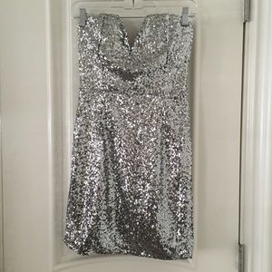 Sequined silver strapless dress with plunge neck
