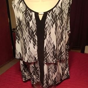 Black and white flowy tank.