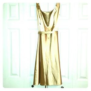 Easy to dress up this solid gold tone dress!