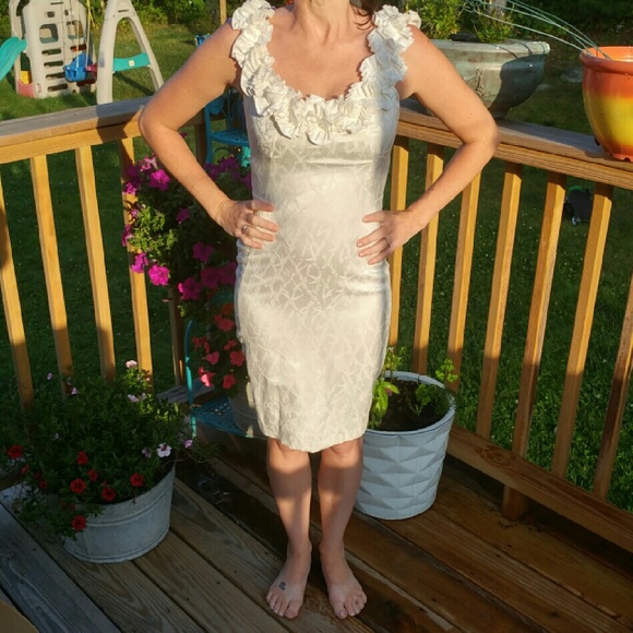 Pretty white dress with ruffle neckline