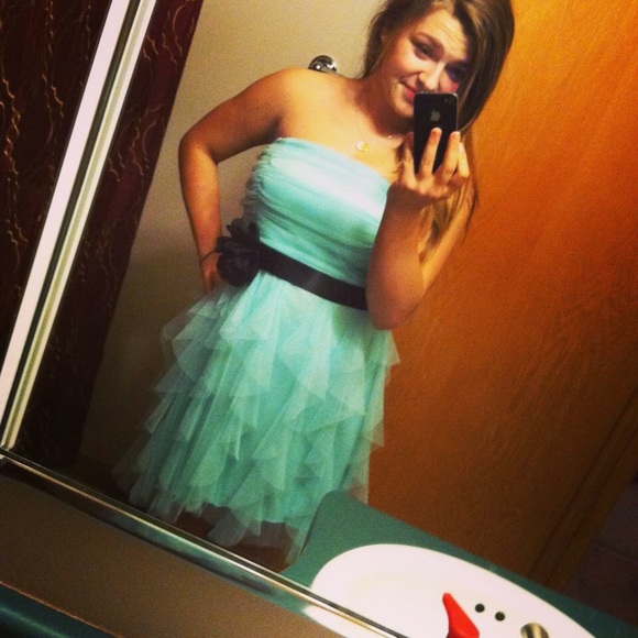 High-Low teal prom dress.
