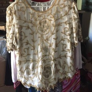 Women beaded top .size 2x.
