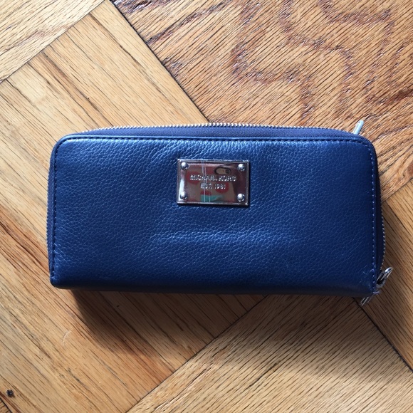 Michael Kors genuine leather wallet.