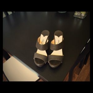 Jimmy Choo high heel sandals.