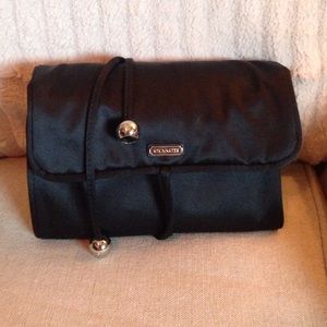 Coach silky folding travel jewelry holder.