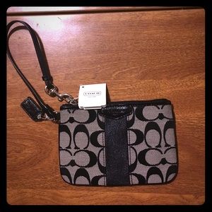 Brand new, NEVER USED coach wristlet!
