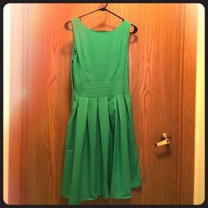 Emerald green 50s dress.