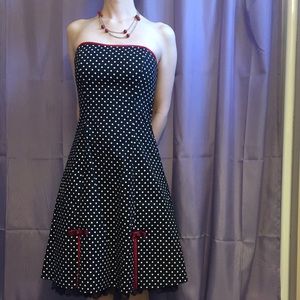 Polka dot dress with red detail