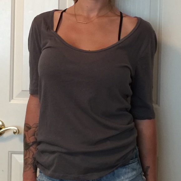 Grey top.